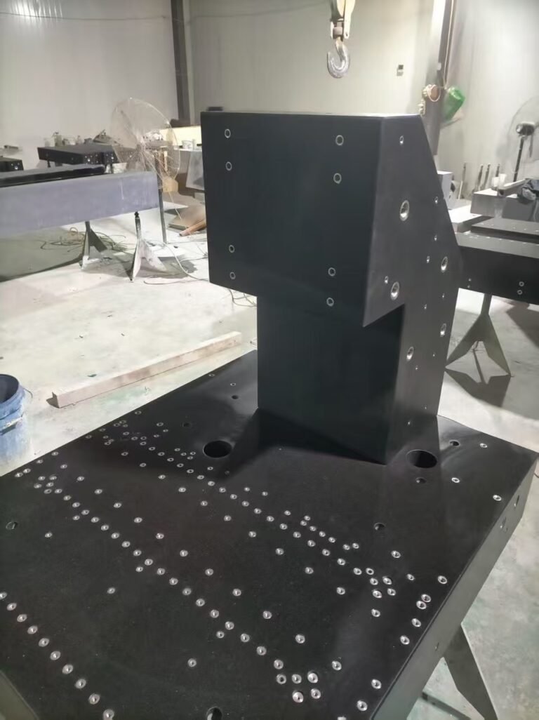 Granite as the base of a coordinate measuring machine