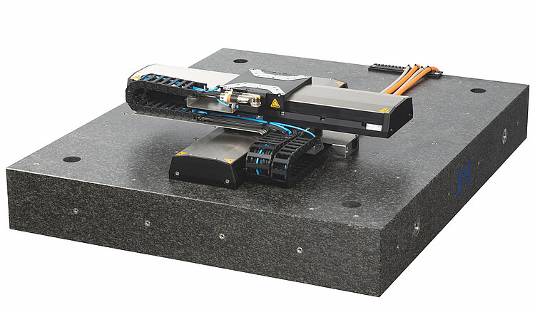 High-precision granite machine tool base with threaded inserts